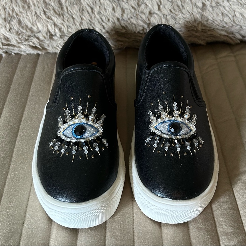 Kurt Geiger Kids Black Slip-On Shoes with Eye Design